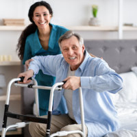 Caretaker caring an elderly man